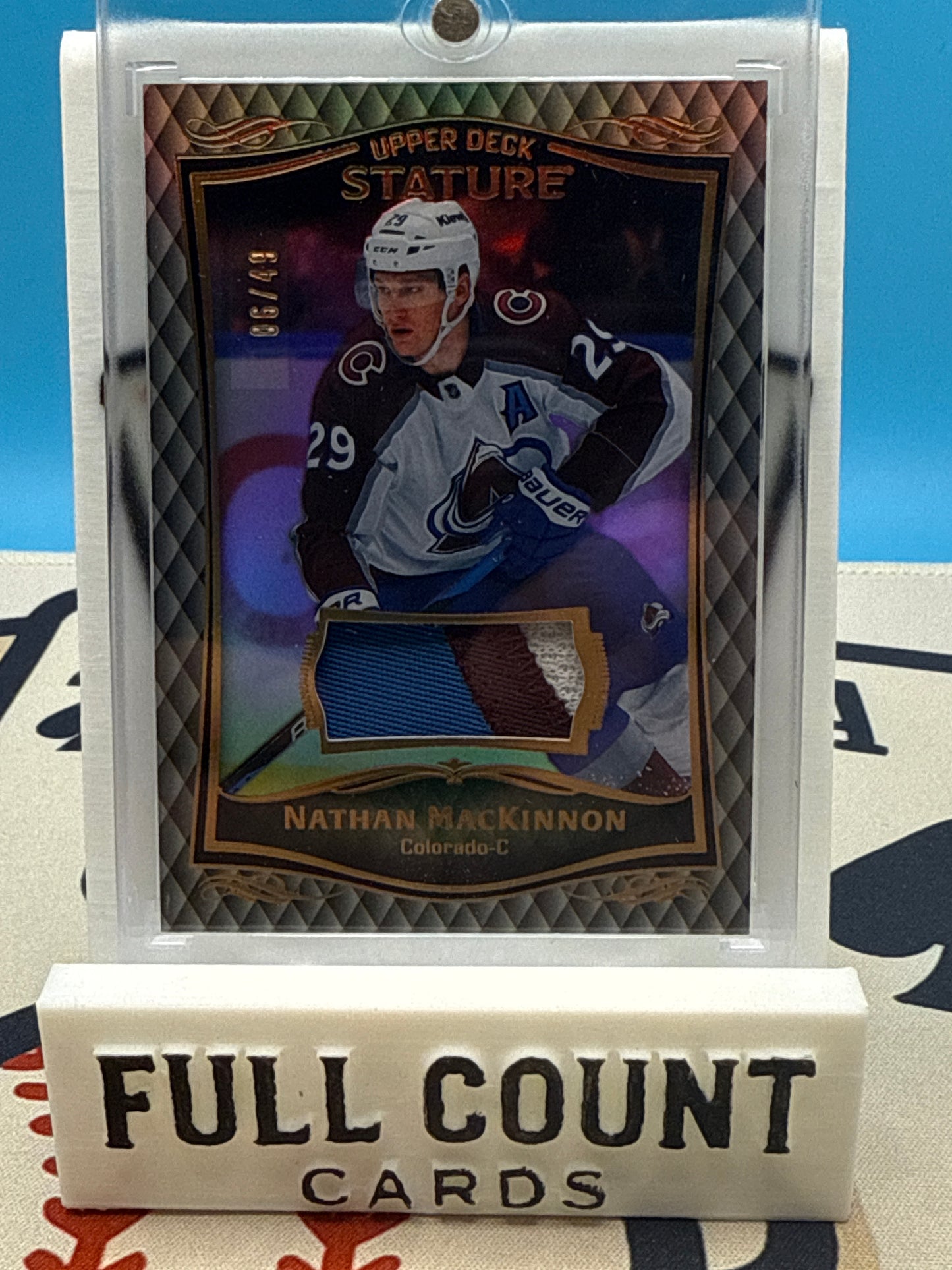 2023-24 UD Stature Nathan MacKinnon 3-Color Patch /49 Avalanche SSP